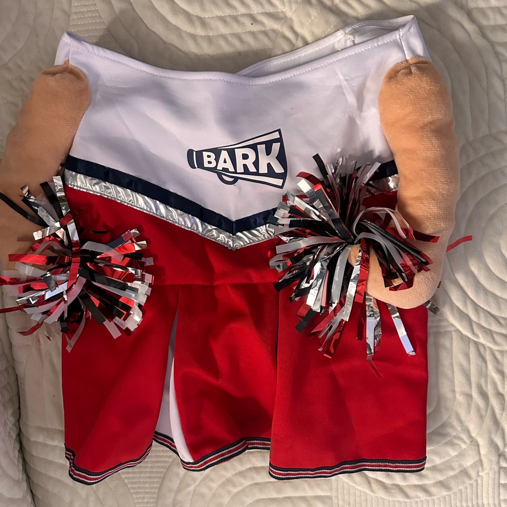 โฅ๏ธred and white cheerleader costume for a pet, branded "BARK"